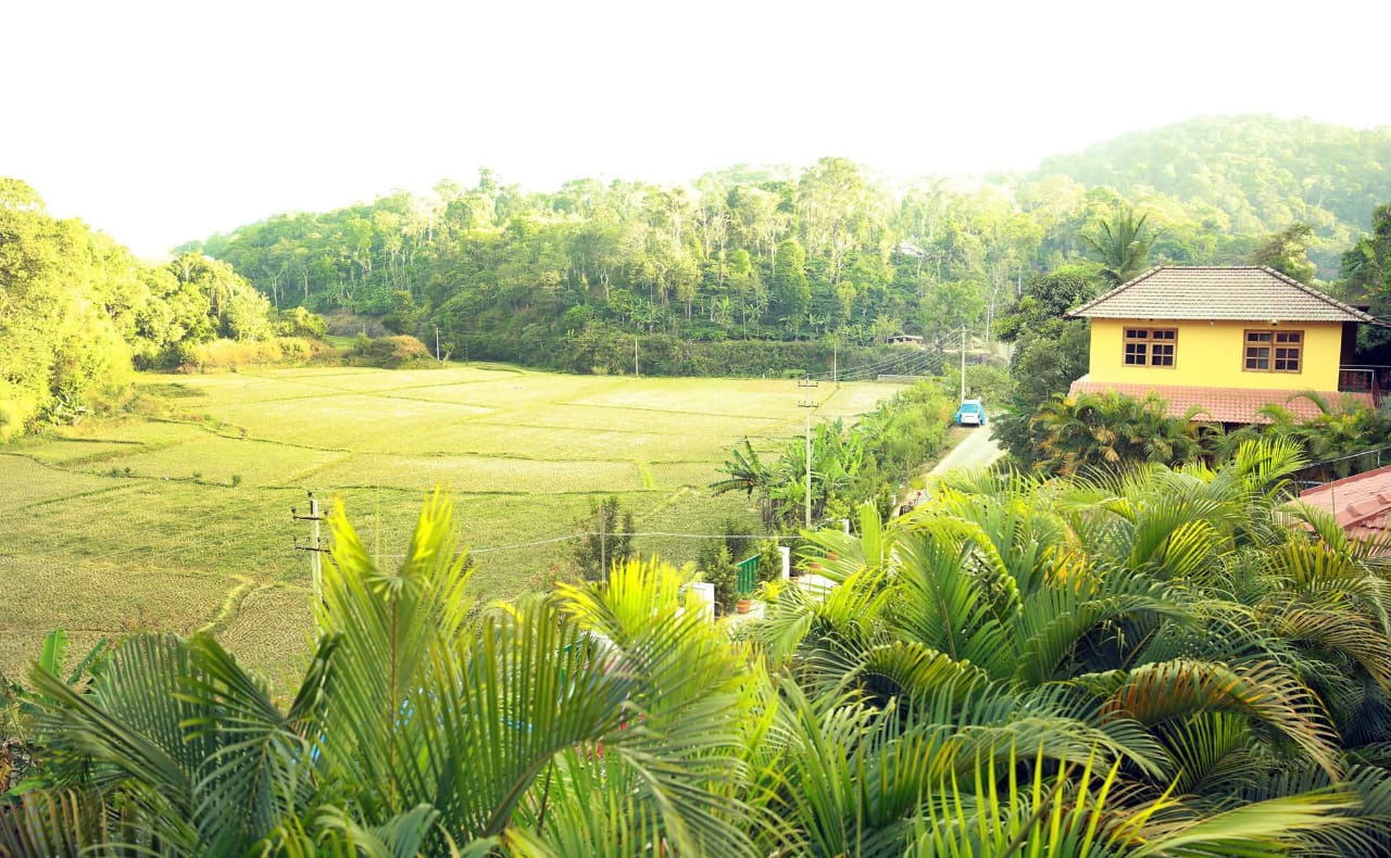 Fields and hills near Deva Maani